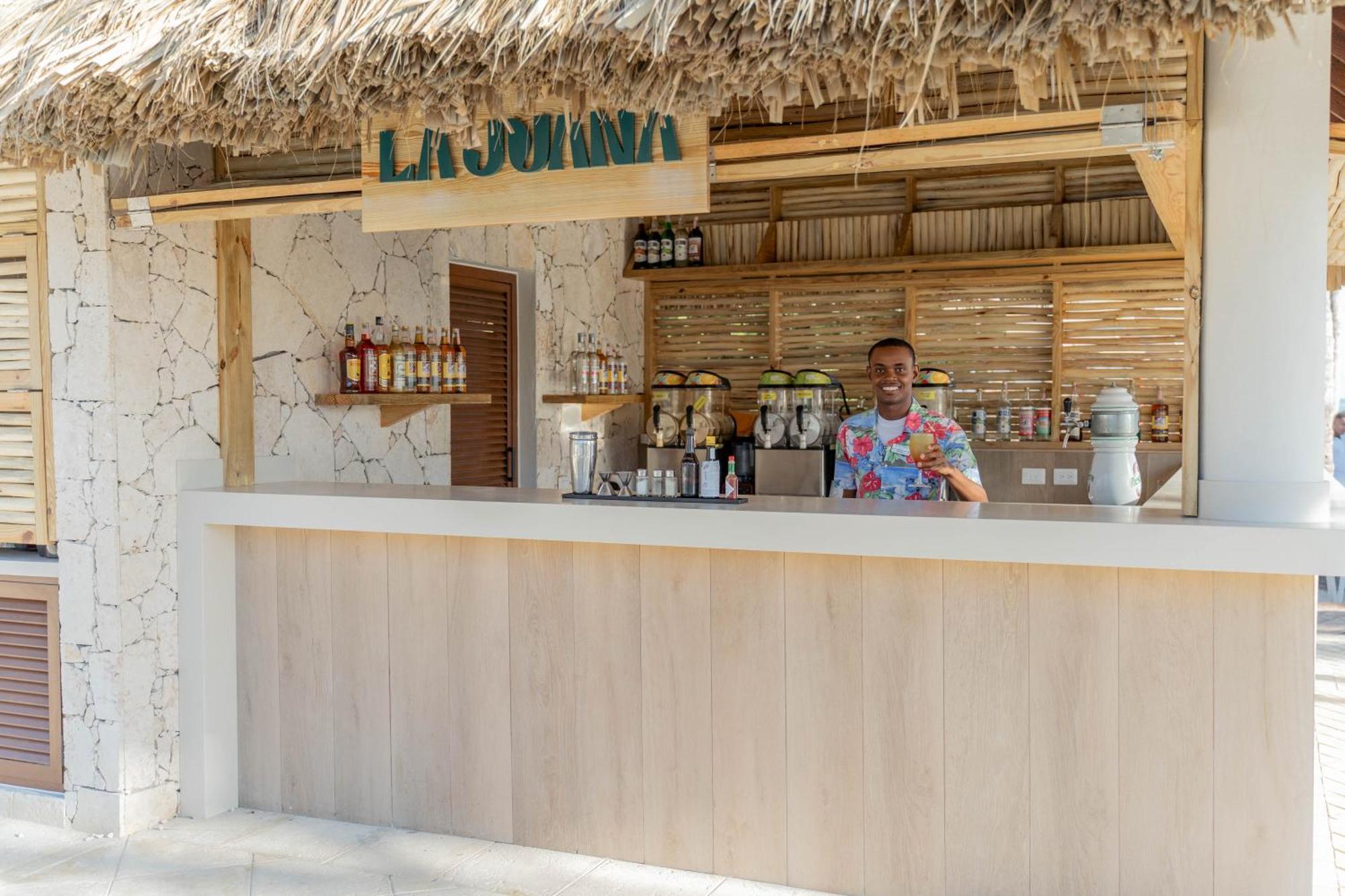 Bahia Principe Grand Bavaro Punta Cana Exterior foto A bartender at work
